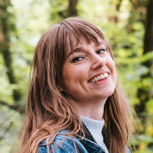 happy-woman-outside-in-trees