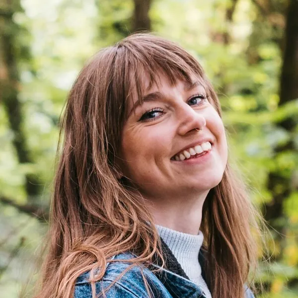 happy-woman-outside-in-trees